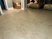 No flooring all concrete? The listing showed this place had flooring