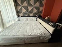 The king bed has no space for night stands! You need to climb onto the bed from bed tail!
