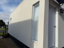 There are 2 seperate units in this white box. We stayed in one of these units at far back.