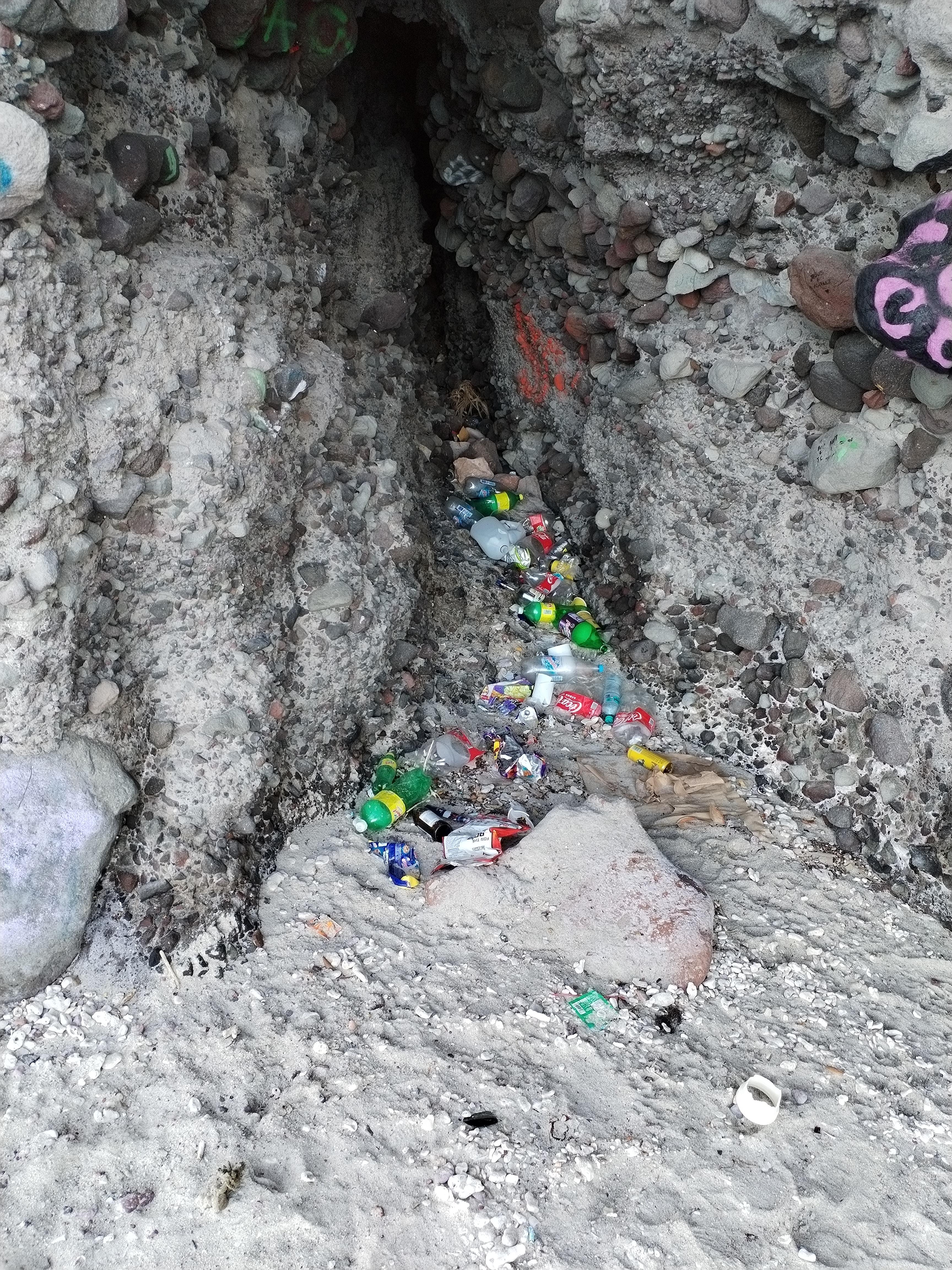 Trash in surrounded areas on the beach