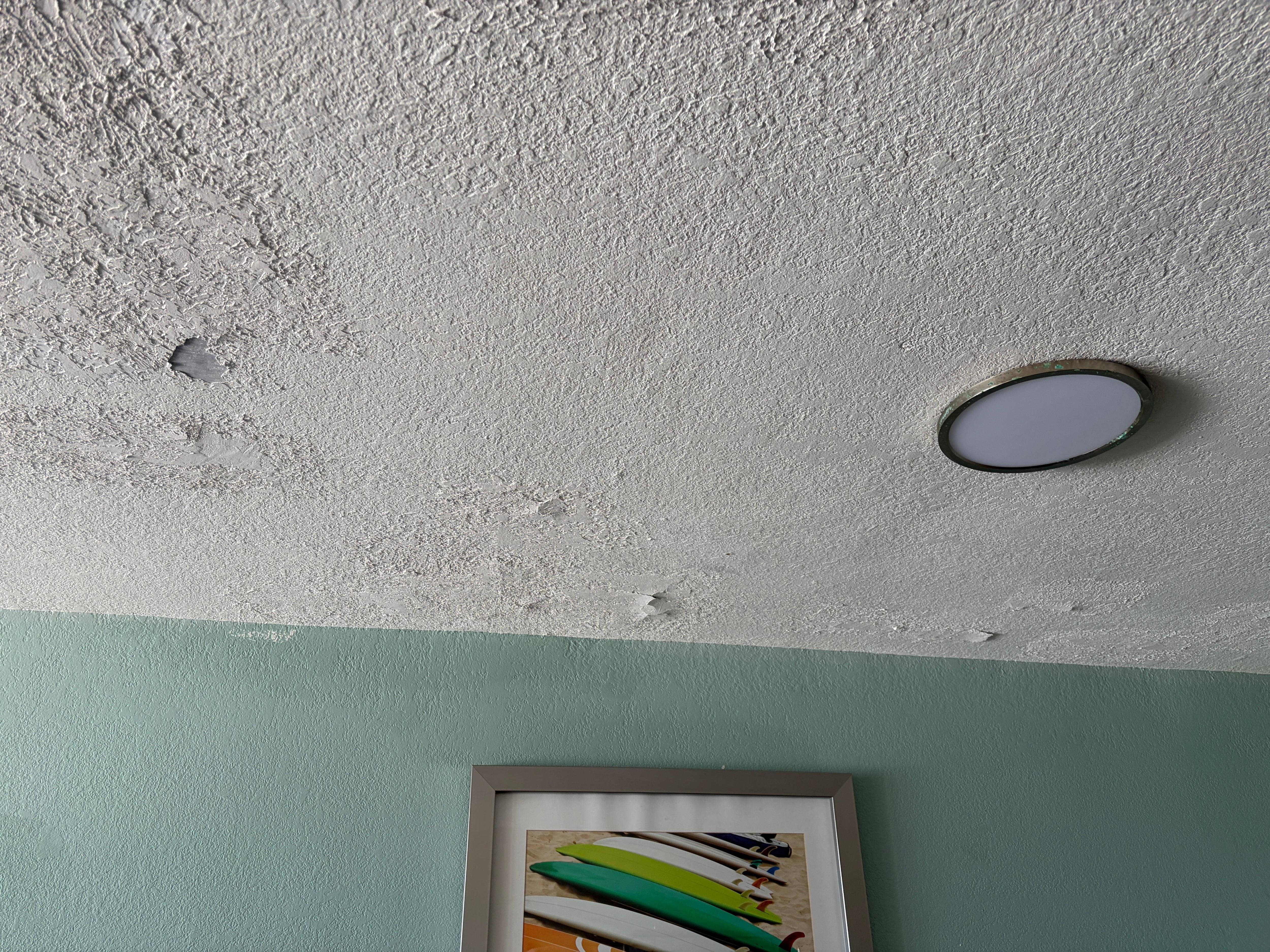 water damage on ceiling. it covered the entire room. 