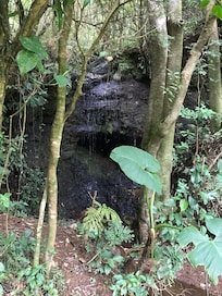 On site waterfall and cave