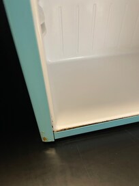 Leaking, rusty refrigerator