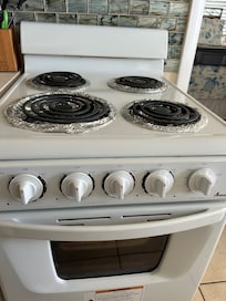 Stove was so filthy that it belched smoke and cannot be used for fear of being a fire hazard