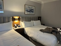 Love that there are tables on all sides of the beds