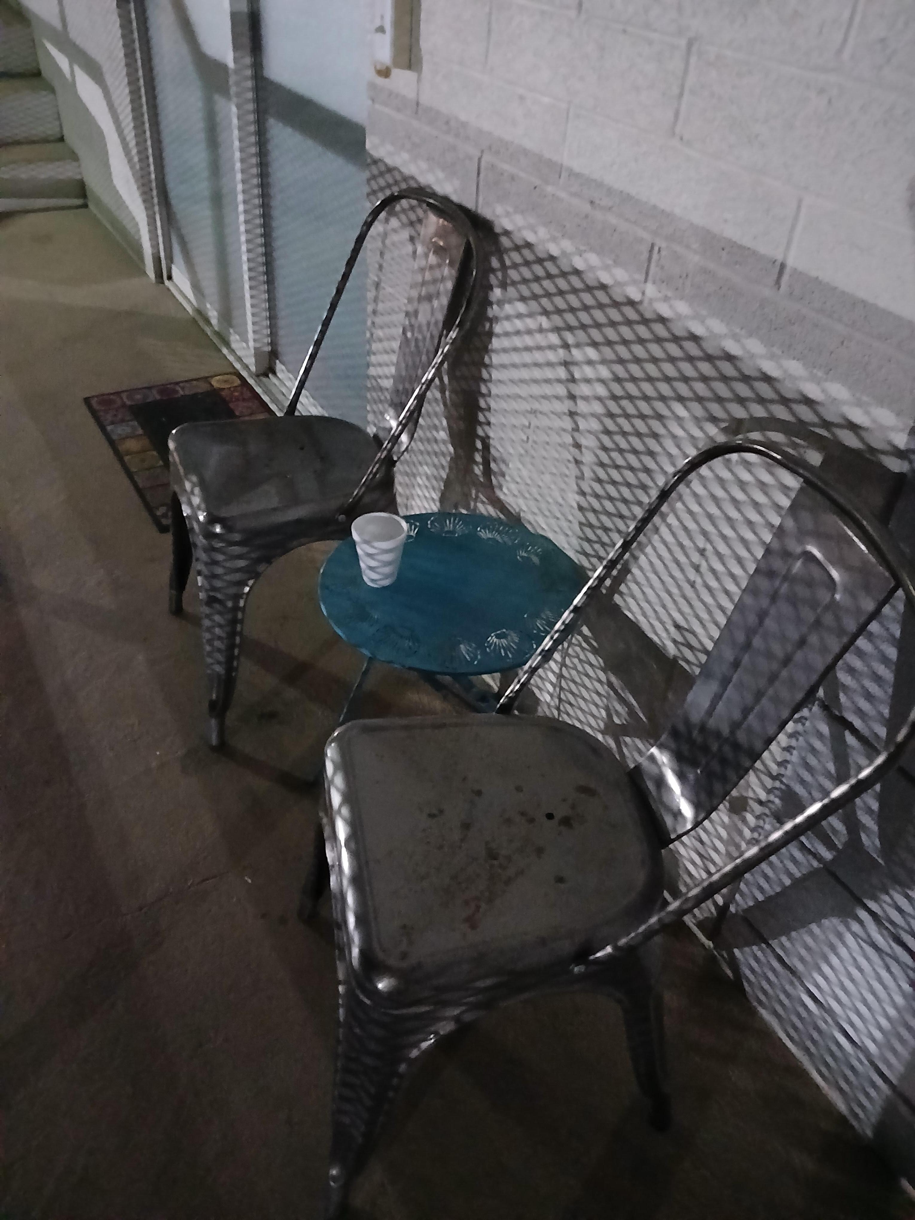 Each room has a few tables and chairs outside of them