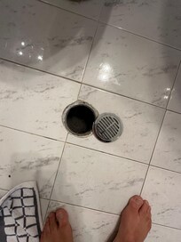 The drain in the bathroom was not secure.