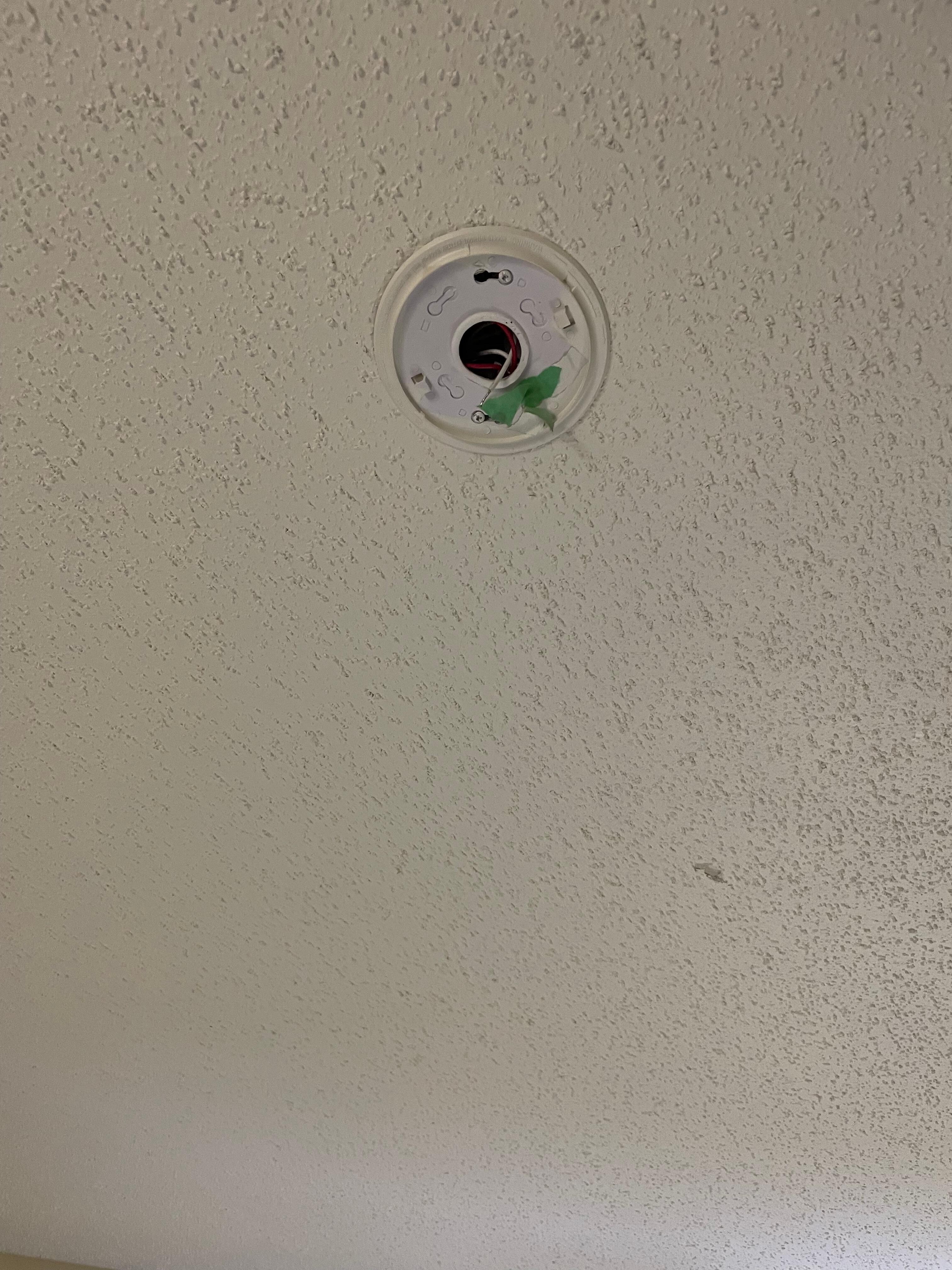 Exposed wires from previous smoke alarm