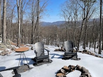 Fire pit area out back with view of mountains