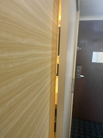 Looking through the door gap into the bathroom.