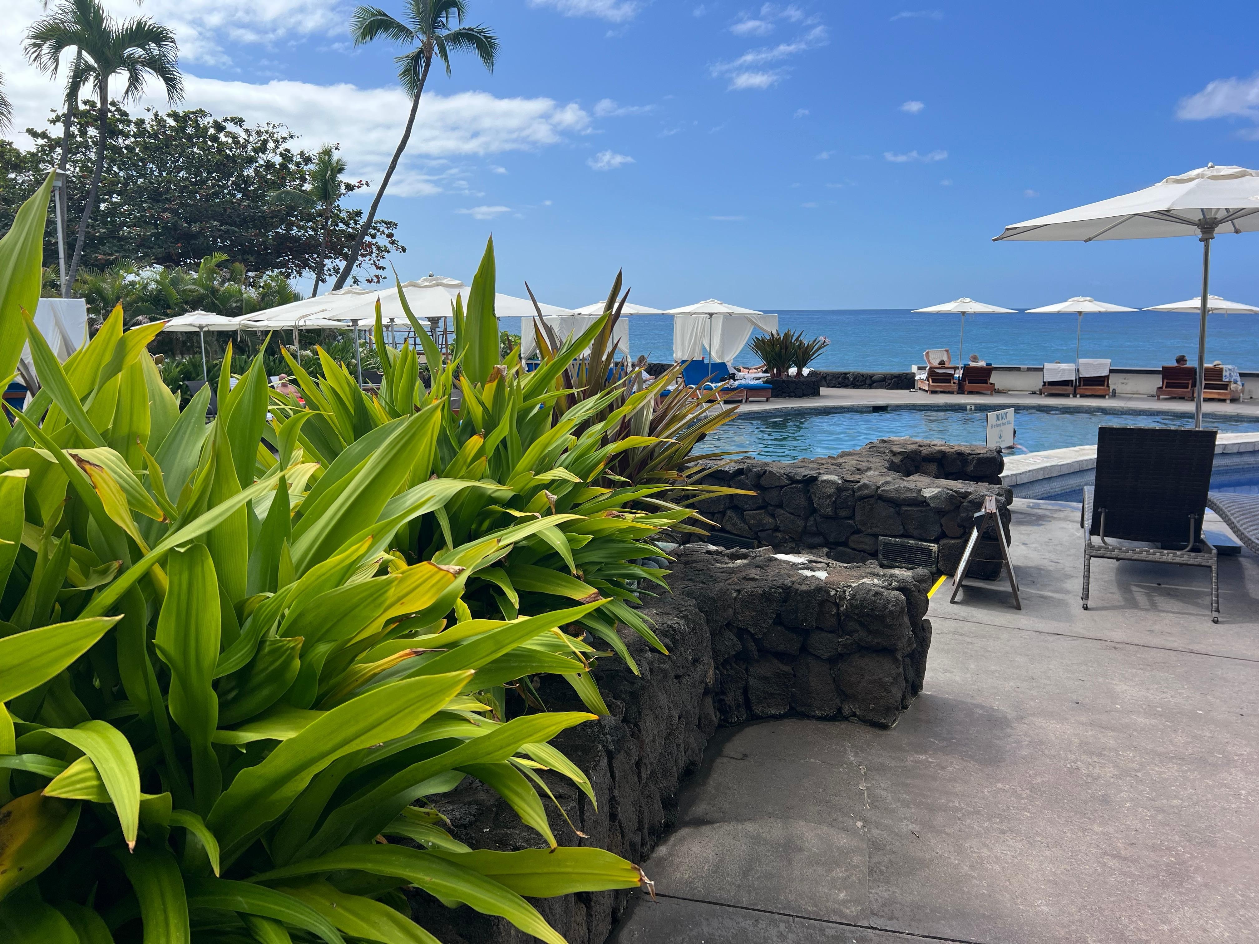 Nice pool with comfy loungers and awesome view