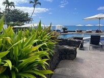 Nice pool with comfy loungers and awesome view