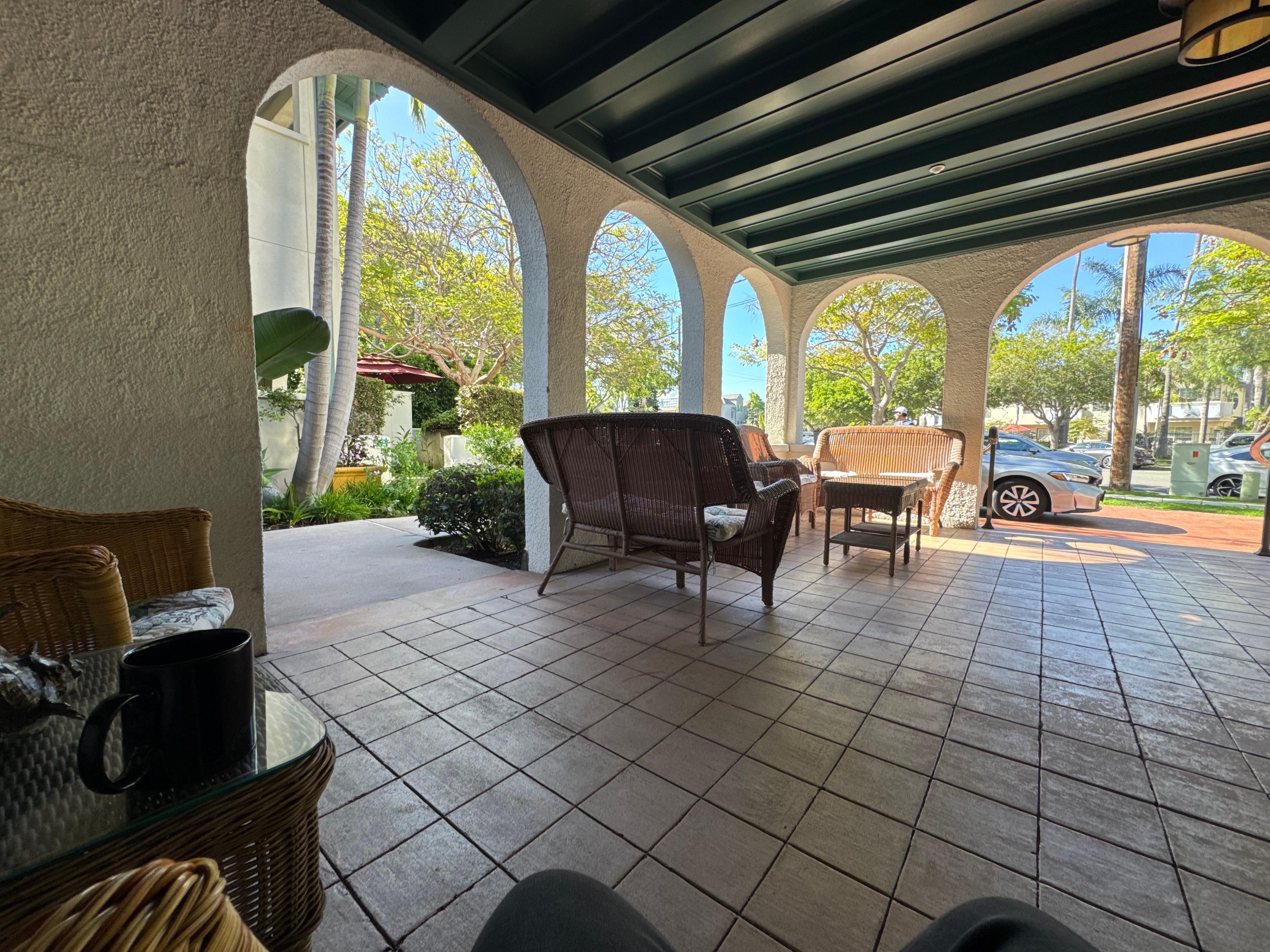 Patio facing the street, perfect for sipping coffee 