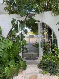 Walkway through property to beach