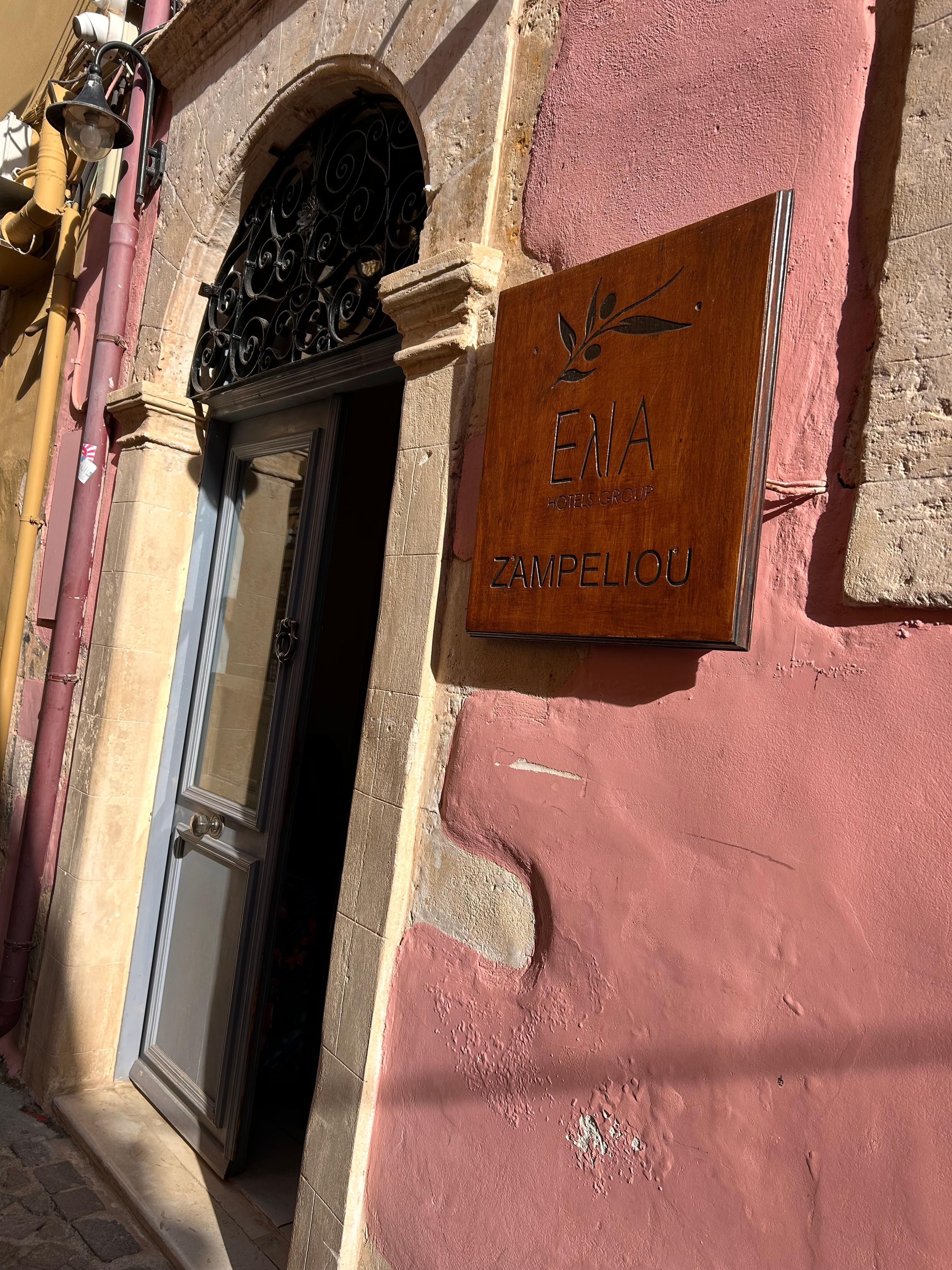 Hotel lobby/reception is located on the back side, opposite the harbor