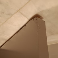 Bottom corner of door, really rotten and bad.
