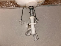 Located under the sink