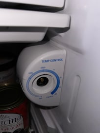 Broken fridge/freezer knob temperature adjuster.