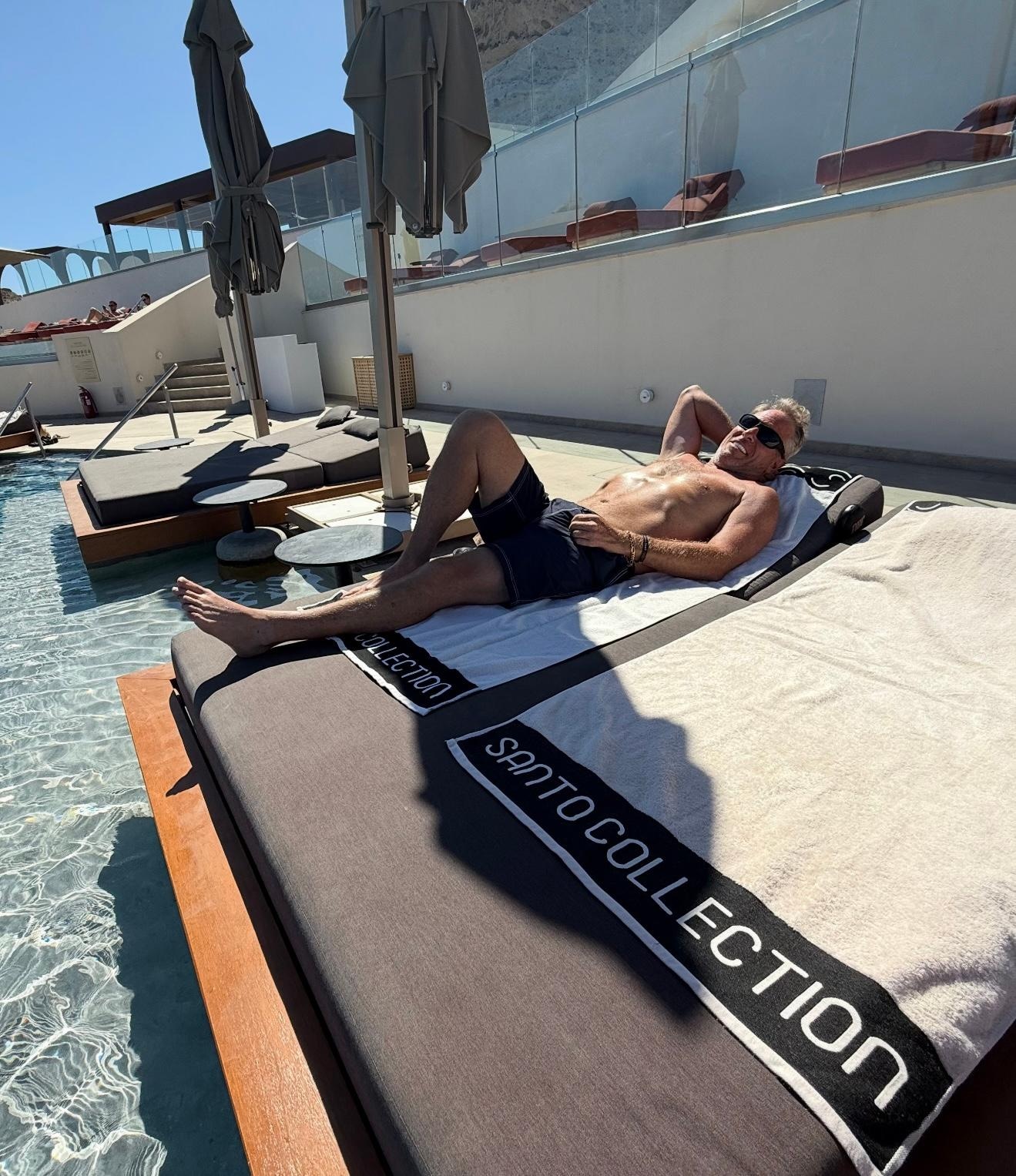 My husband chilling by the resort pool! 