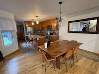 View of dining room and kitchen