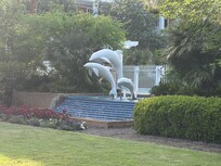 Garden outside gated pool
