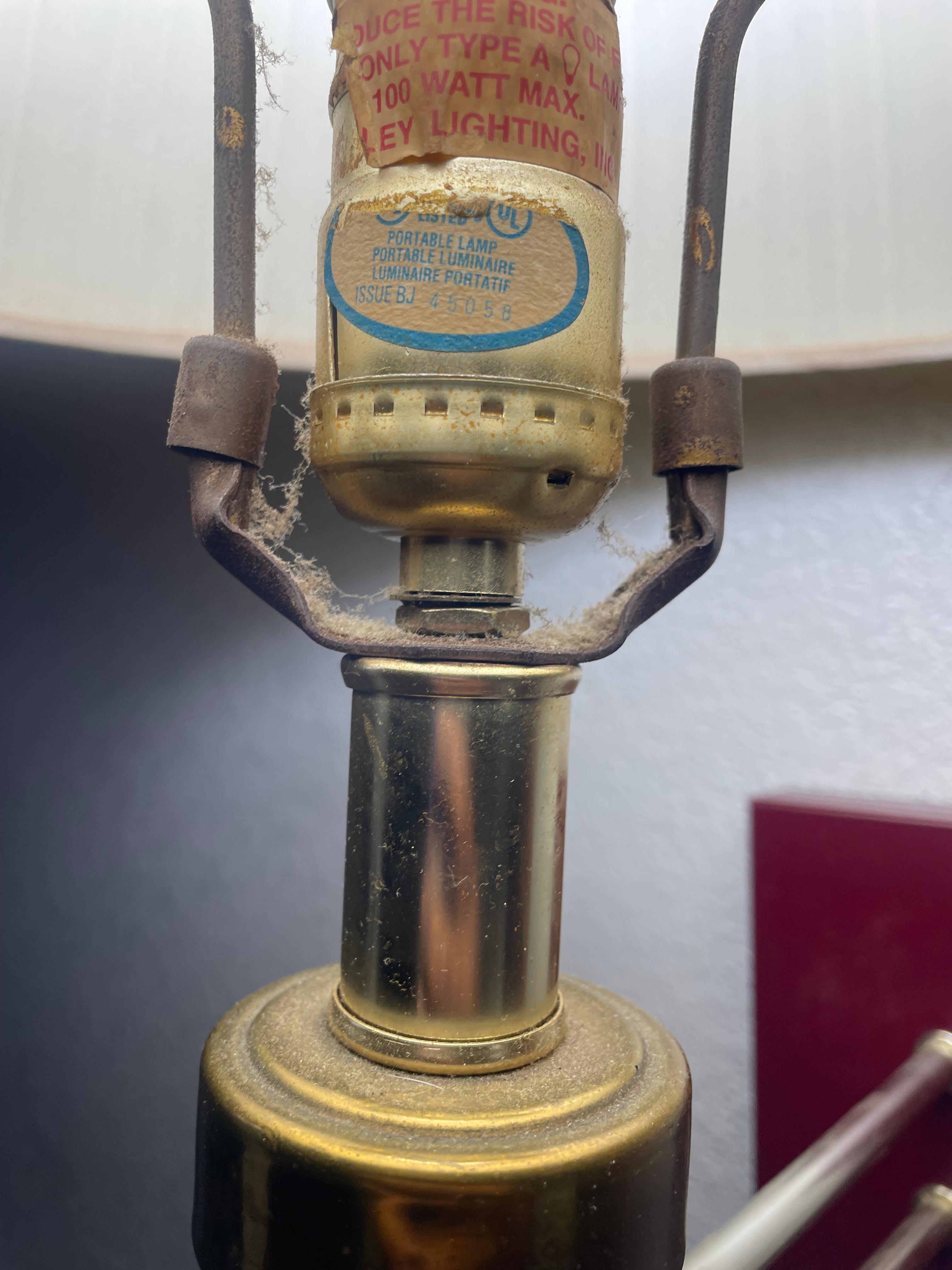 Lamp had billed up dust on it.