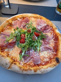 Amazing pizzas at the restaurant ran by the family who own the apartments.