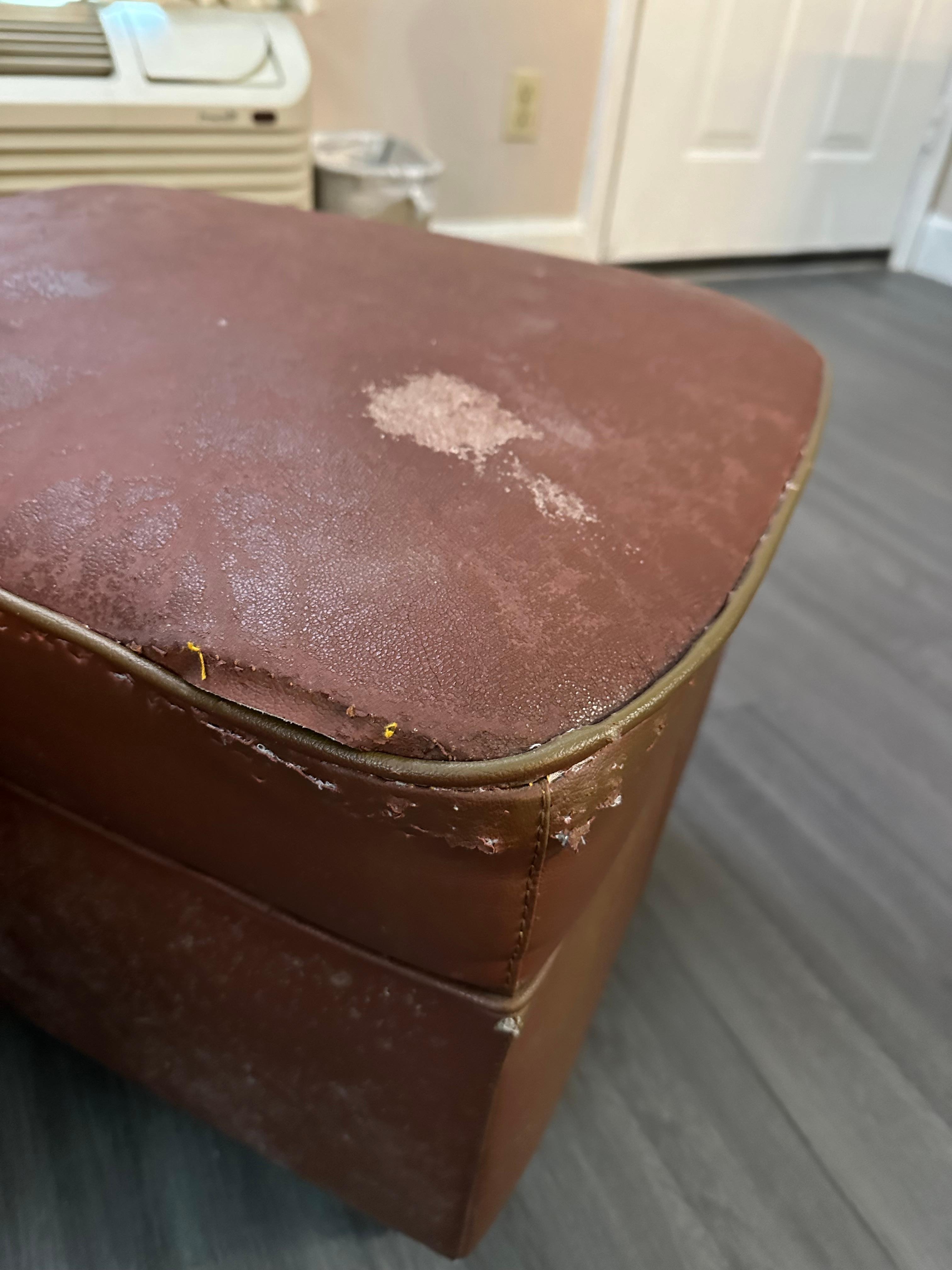 Worn and torn hassock
