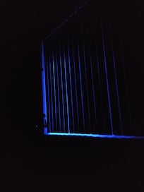 No curtains to block our the annoying blue lights right outside your door. They look cool when you drive up but not shinning in your face all night!