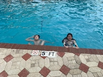My kids enjoying the pool