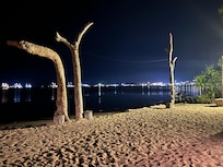 The night view of Labuan bajo harbour from the private beach