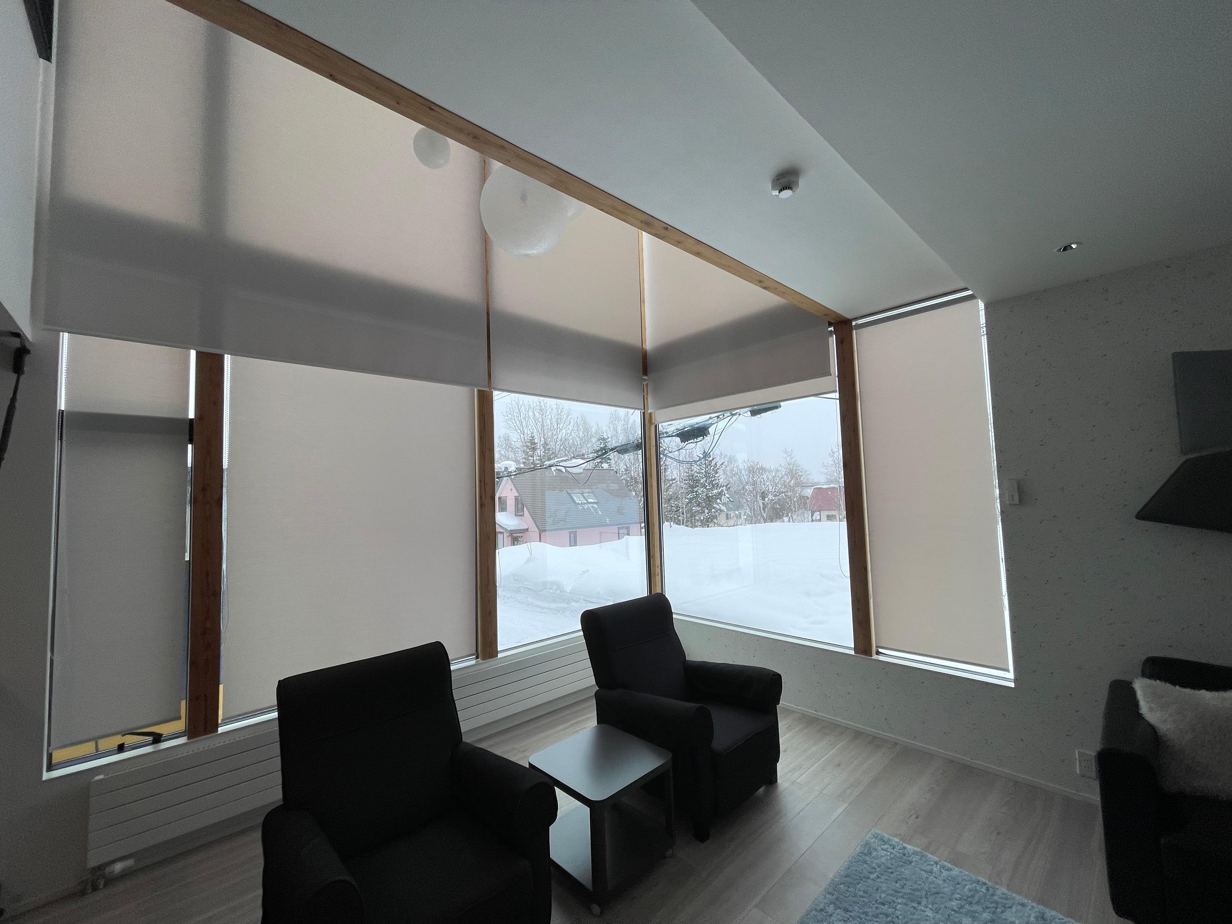 Living area floor to ceiling windows