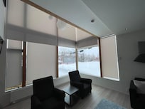 Living area floor to ceiling windows