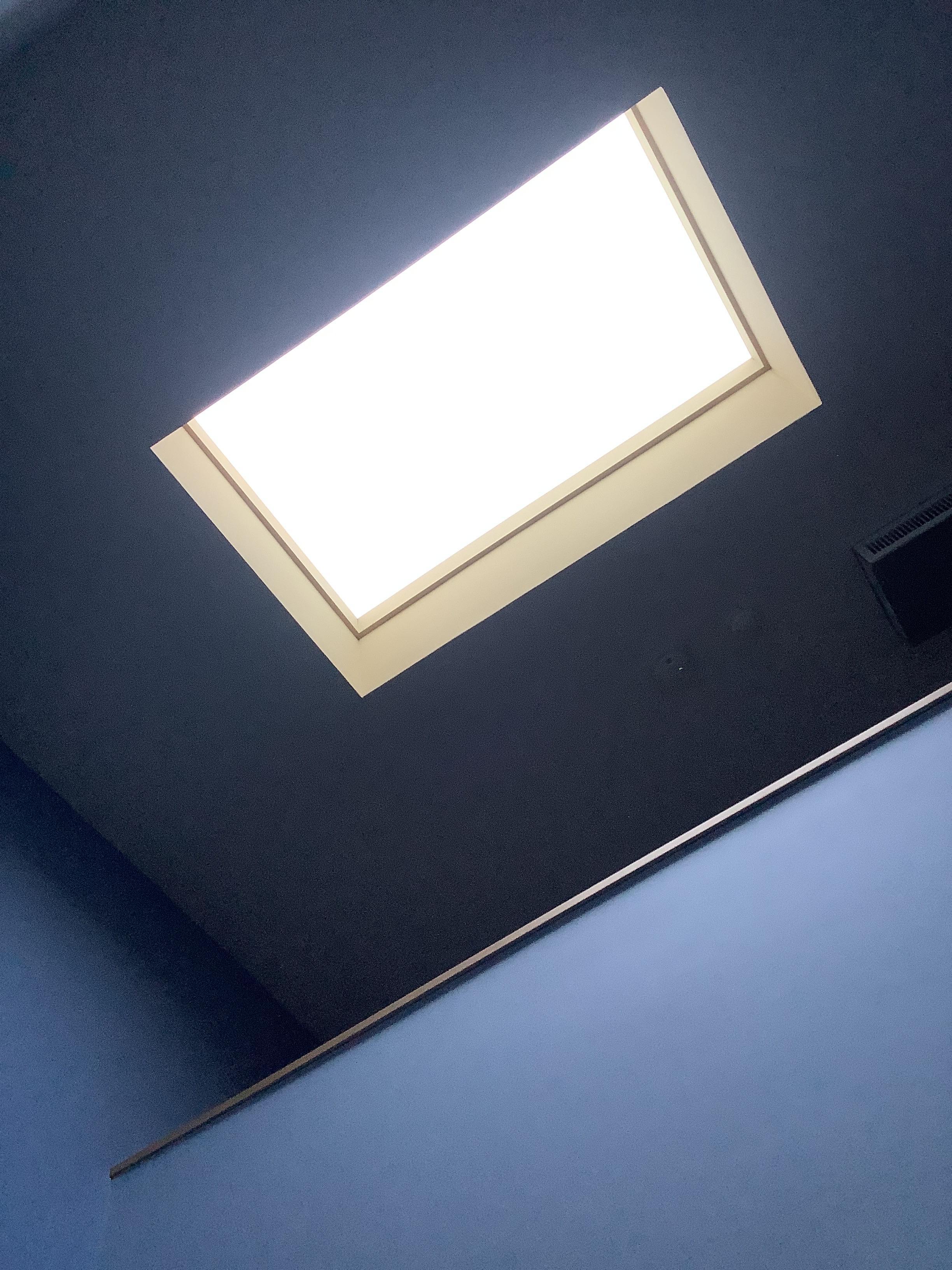 Skylight, no way to shut off the light, right over the king bed too