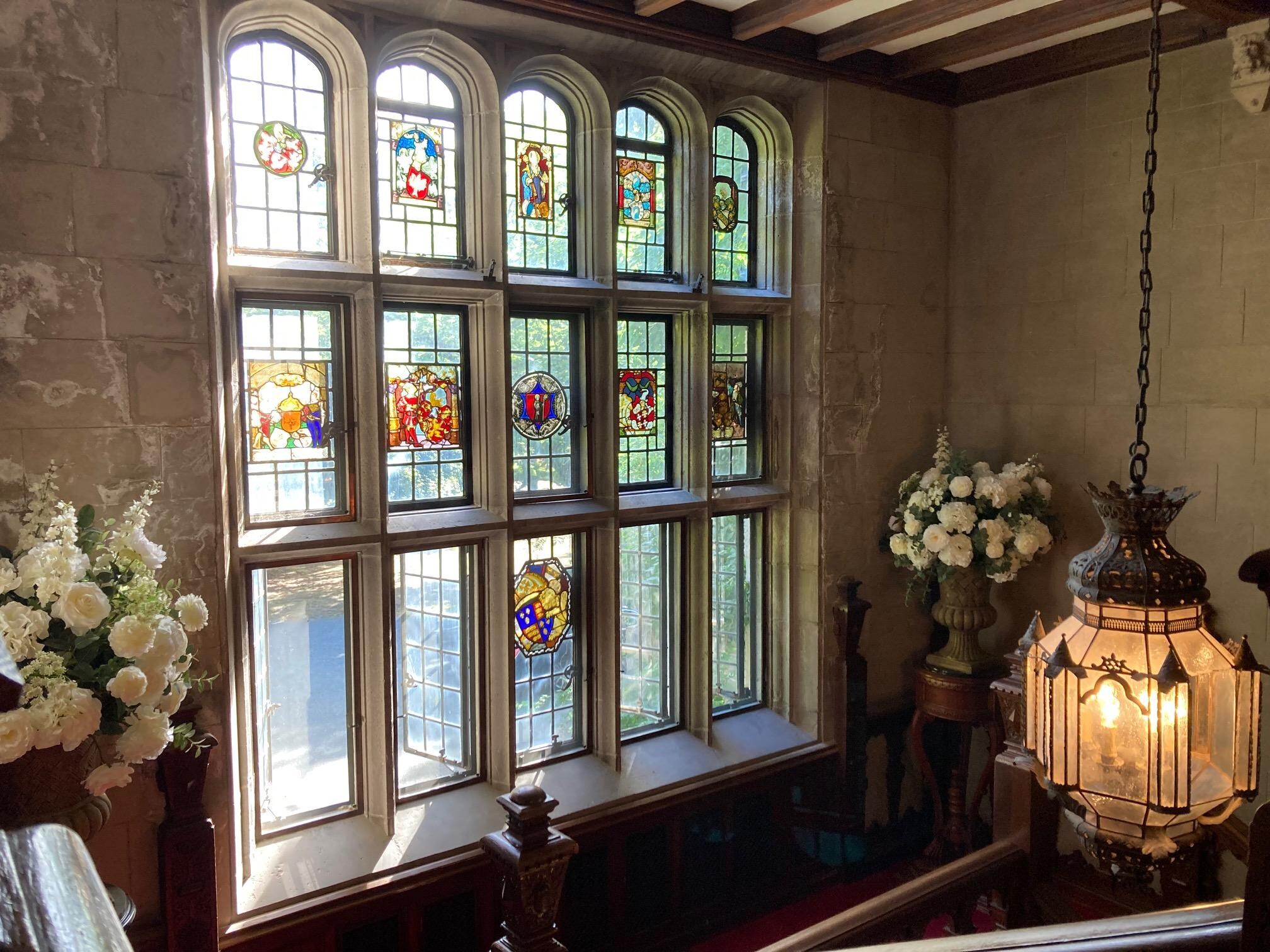 Most beautiful stained glass window on stair landing