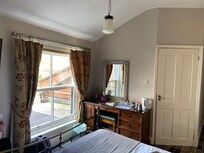 Large room with en-suite bathroom. View behind the pub.