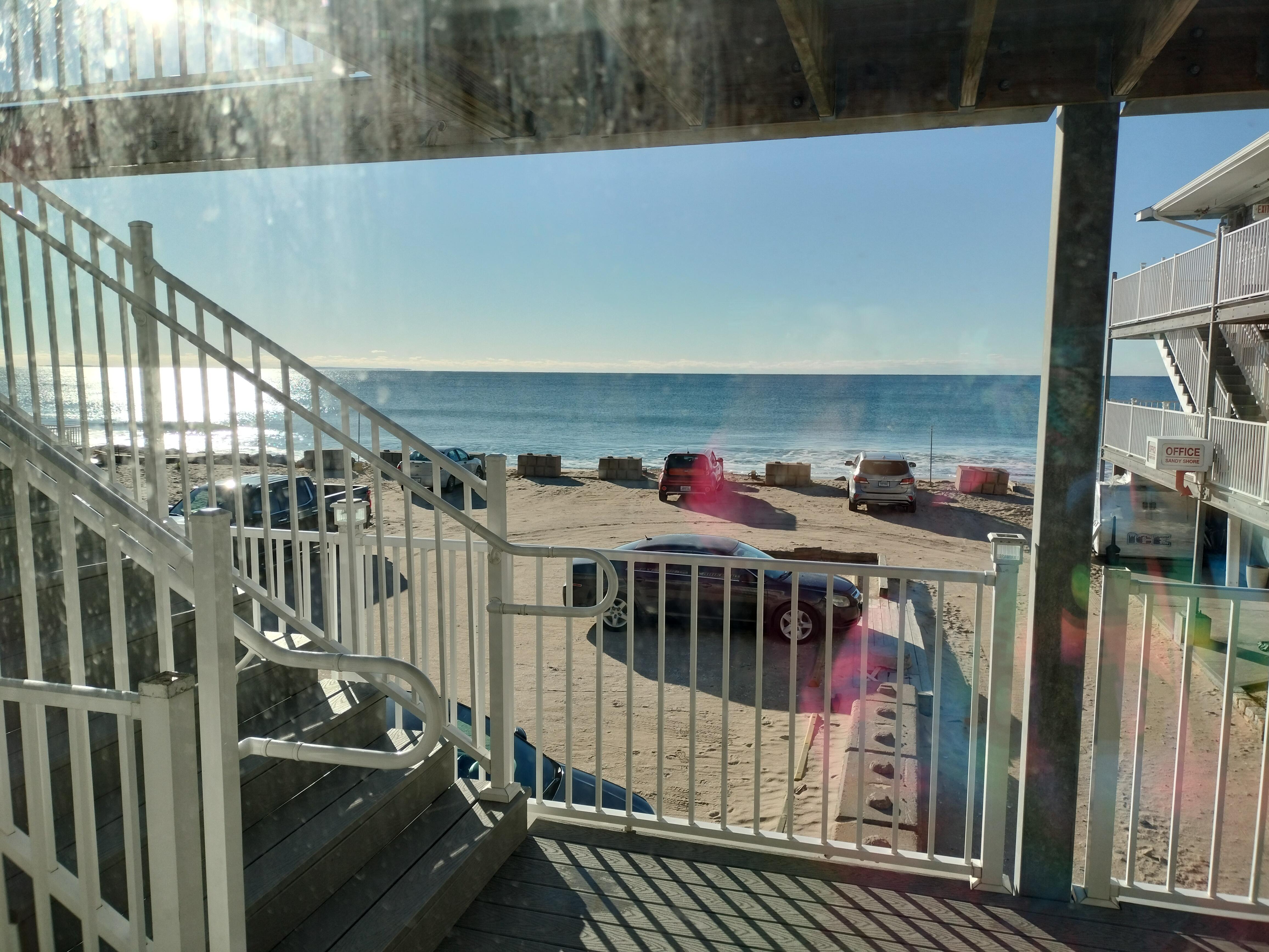 Unpaved parking lot right on the beach.