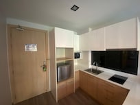 Kitchen with mini fridge.