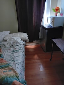 Modest but clean & cozy room furnished with fridge & microwave