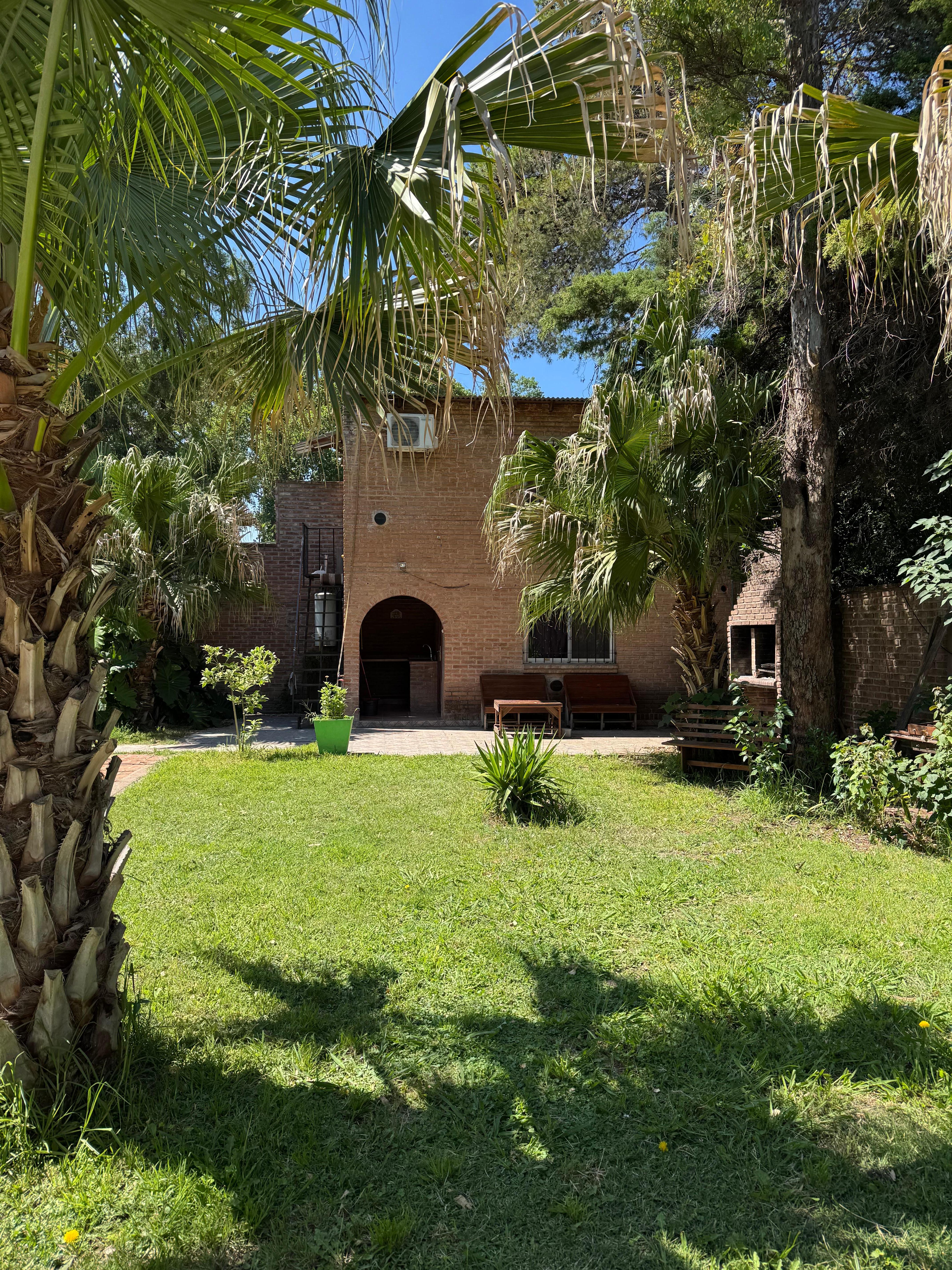 Courtyard & two story bedroom building by bbq grill & common space