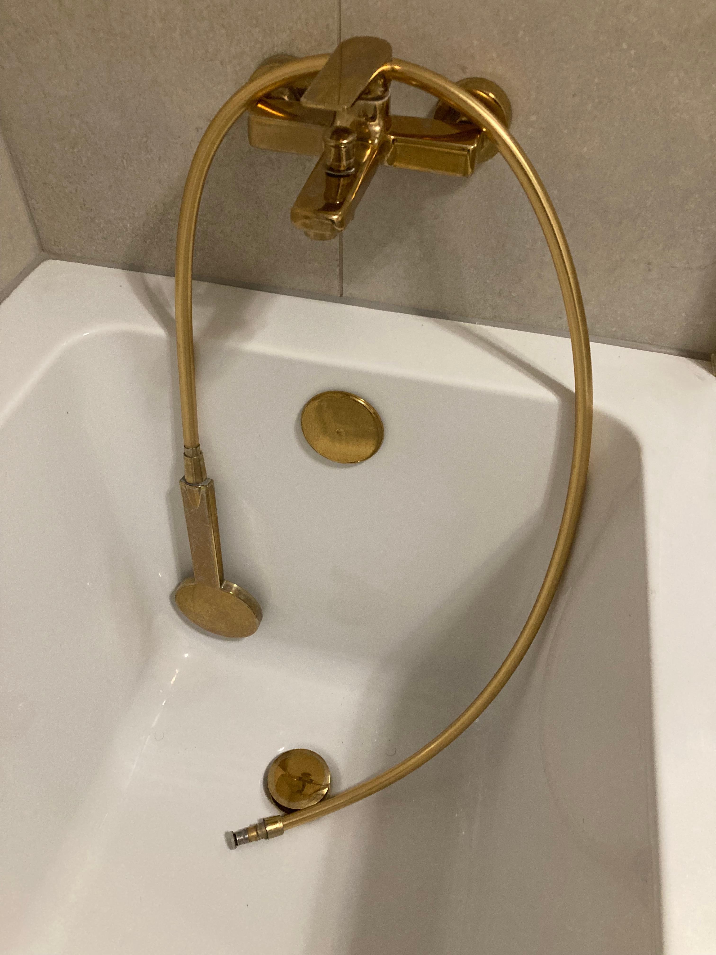 Shower head not plumbed into tap