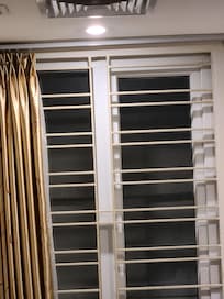 They said that the metal bars were to keep their guest from tossing out the cigarette butts