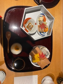 Opening dinner tray. There were six more courses.