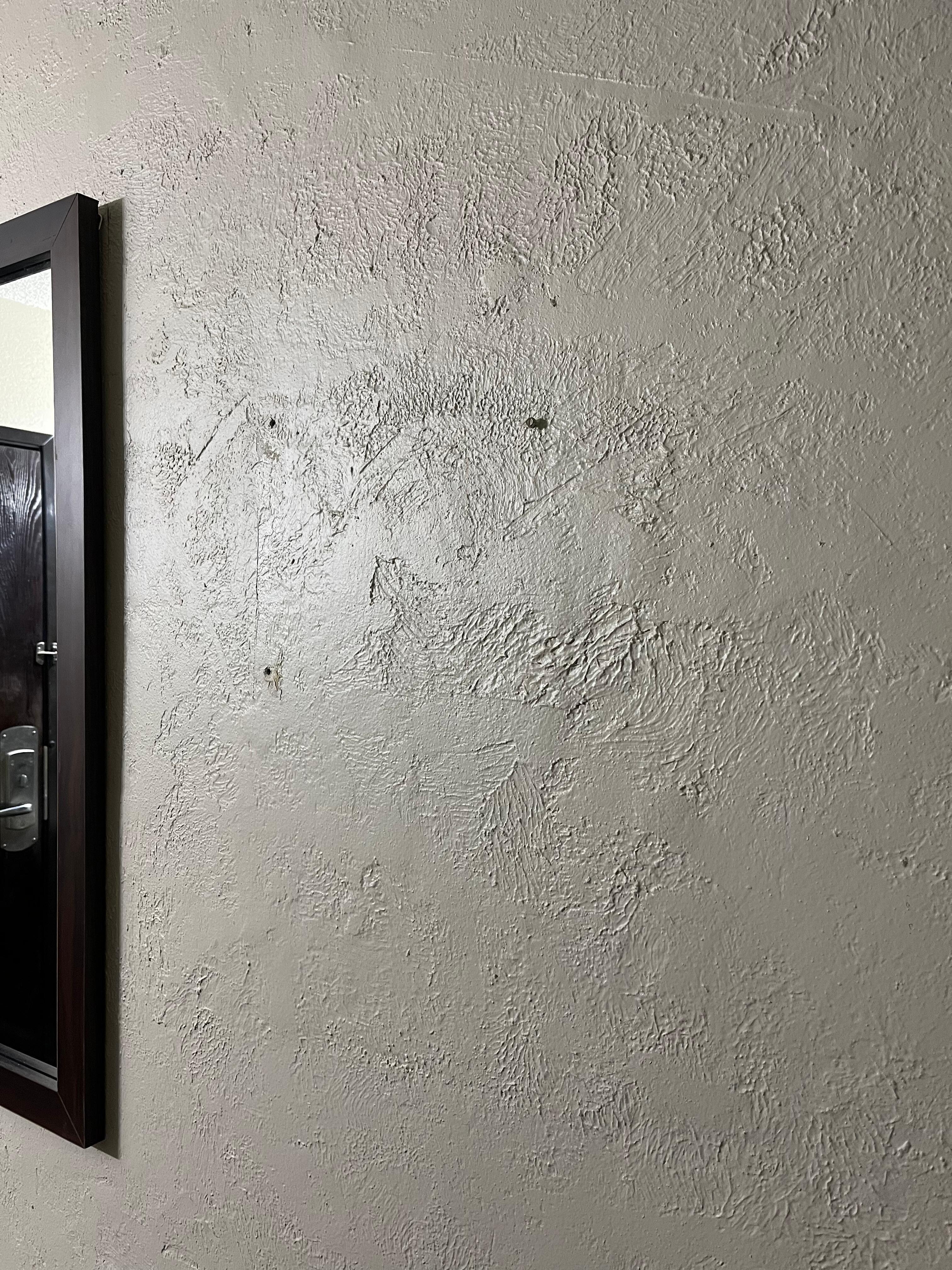 Something was ripped off the wall here