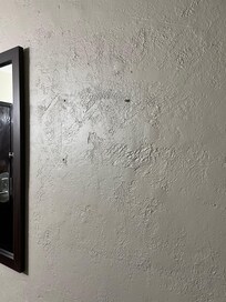 Something was ripped off the wall here