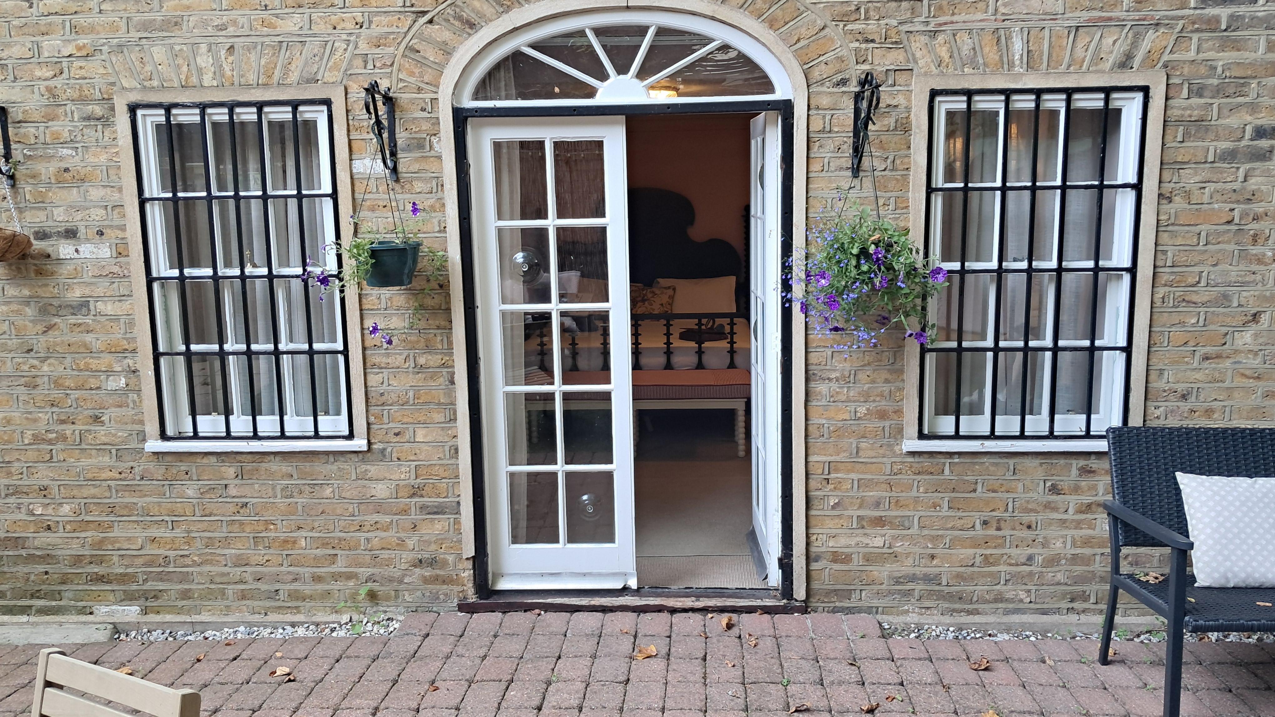 Door from courtyard to bedroom