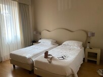 Our room. Tiny and totally plain. No closet to speak of and zero dresser or drawers.