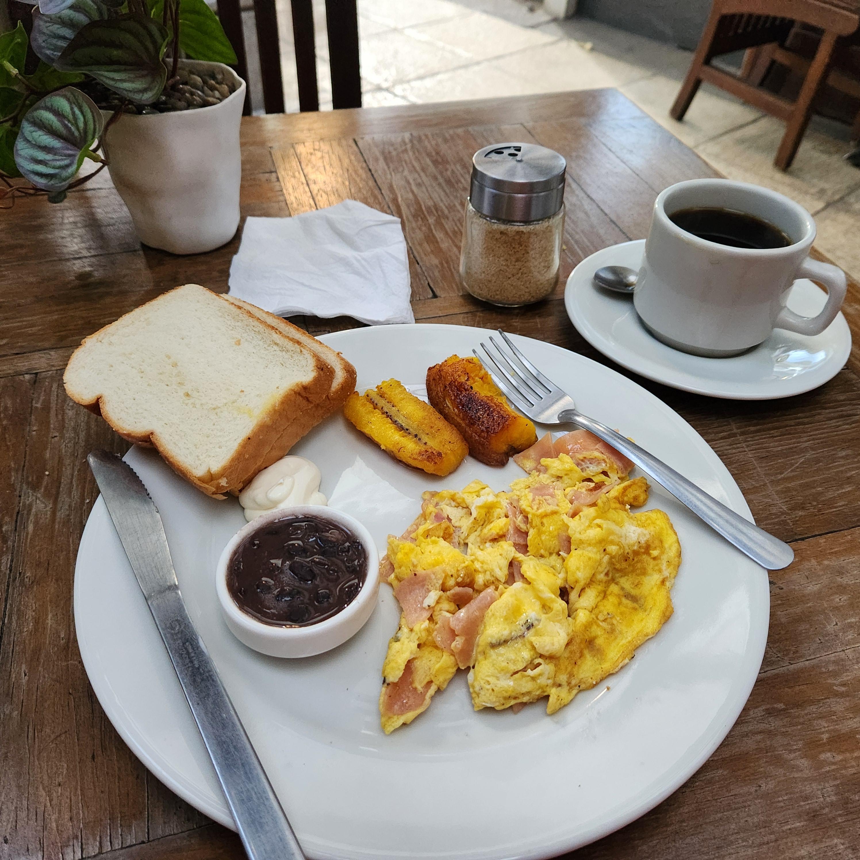 Basic typical breakfast.  Word to the chef, ditch the bread and add tortillas.  