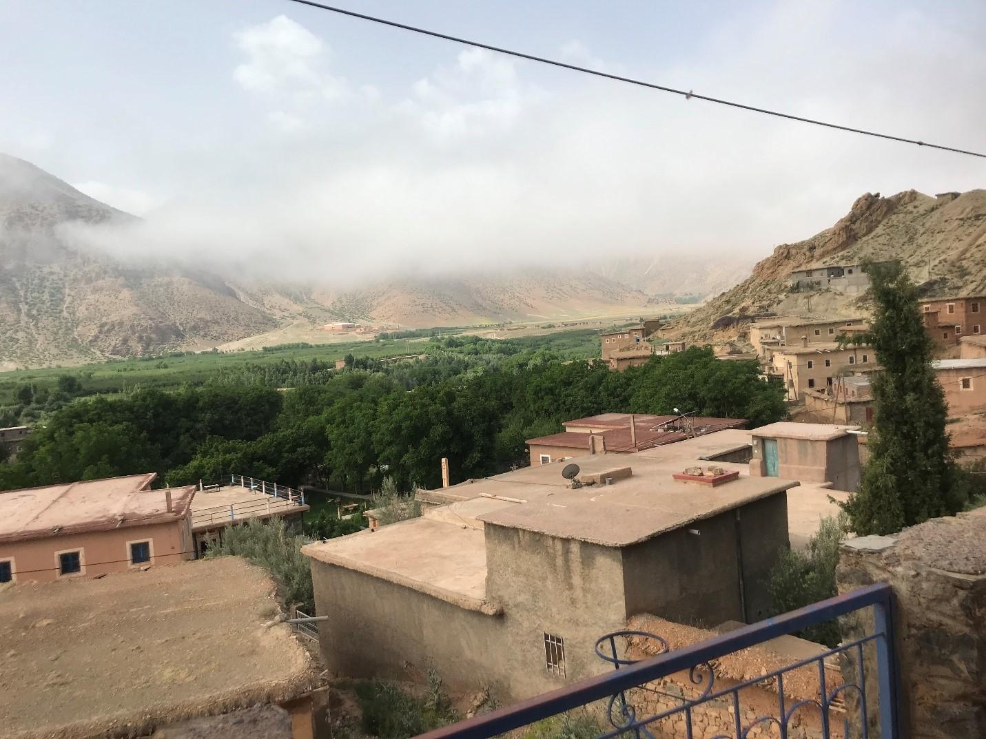 Clouds from the Atlantic majestically glide in and hit the High Atlas. This is from the Kasbah's terrace where I often took meals.