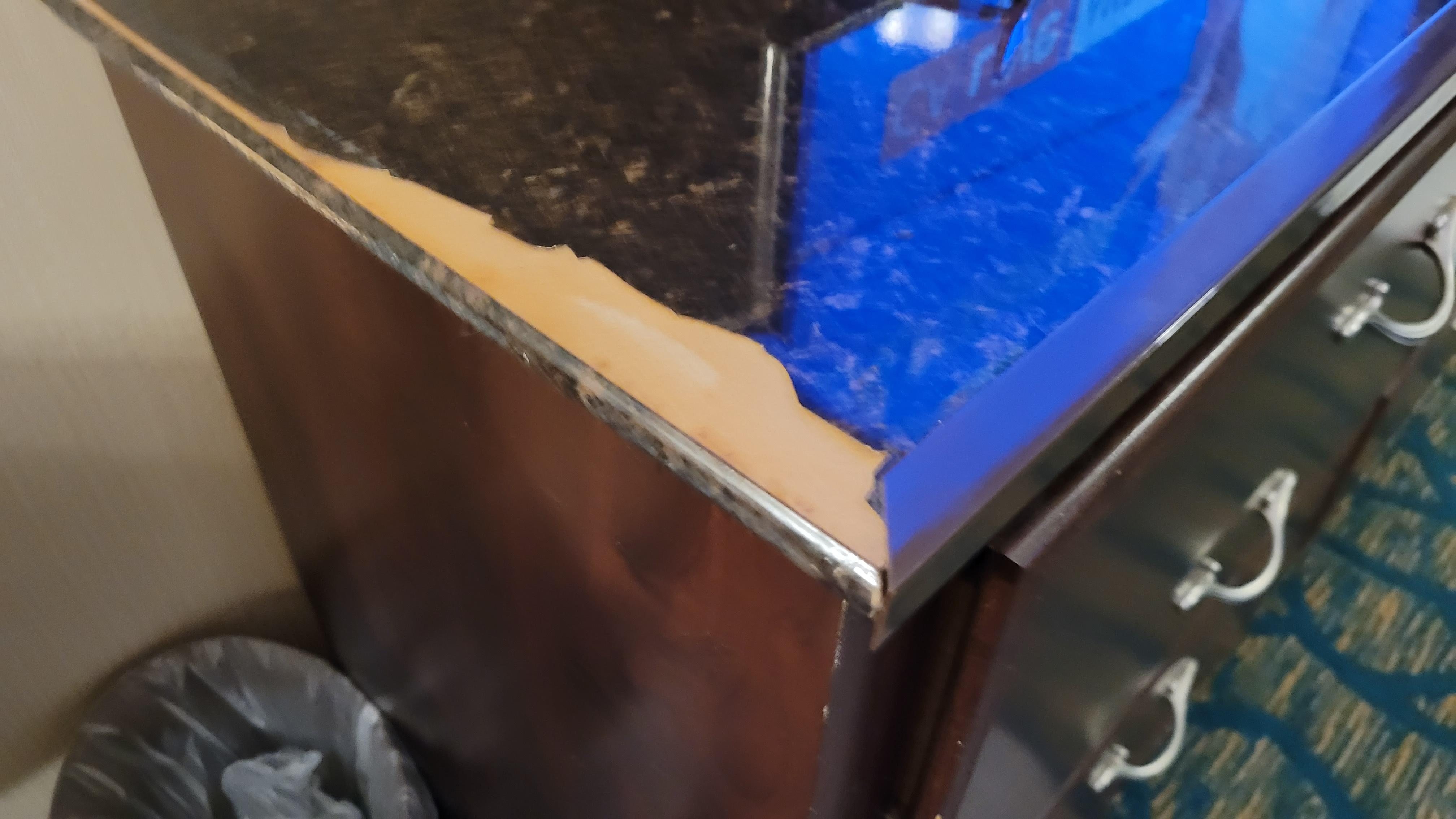 TV stand surface damage